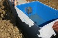 Coated sludge tank